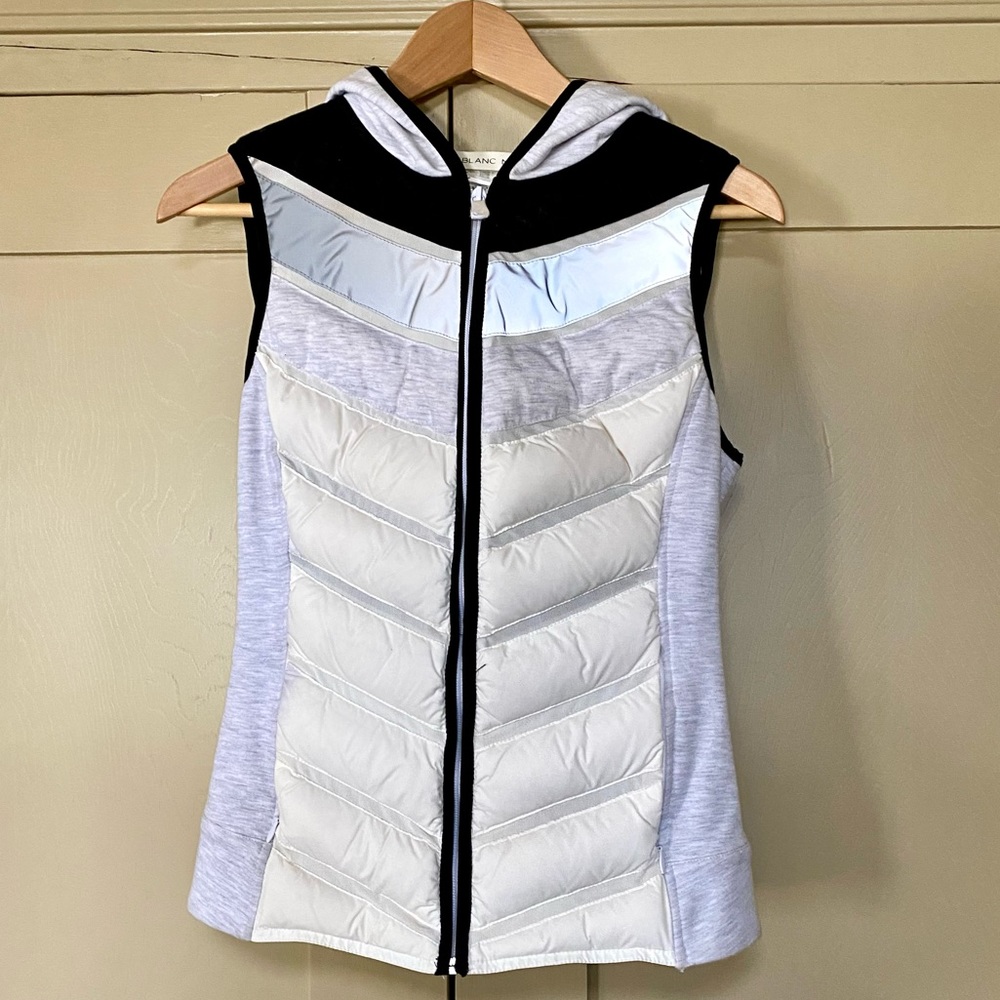 Blanc Noir puff hooded vest with reflectors
